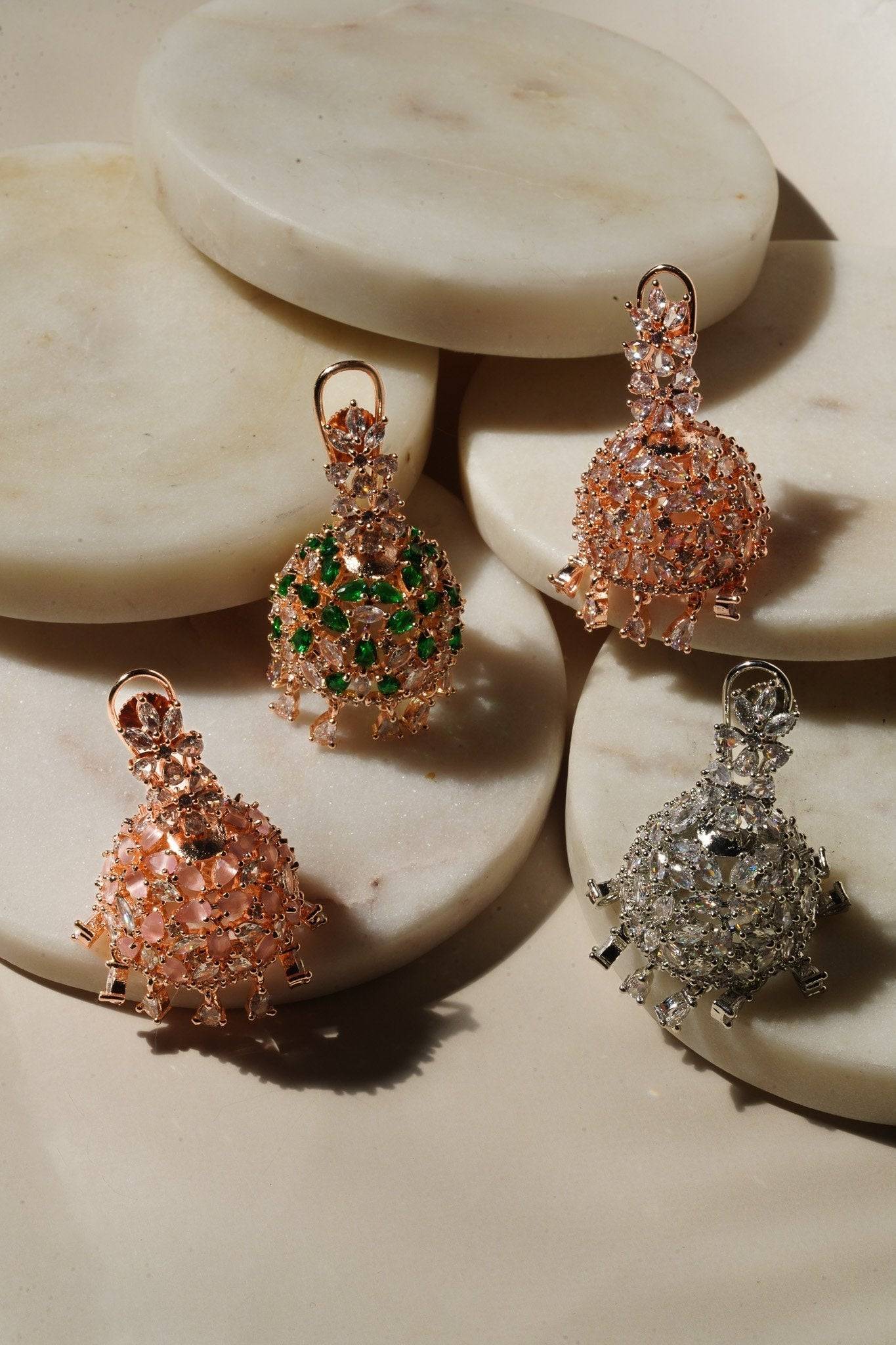 Sneha Floral Jhumka Earrings - Rhodium or rose gold plated, featuring a detailed floral print design, perfect for Western and Indian attire.