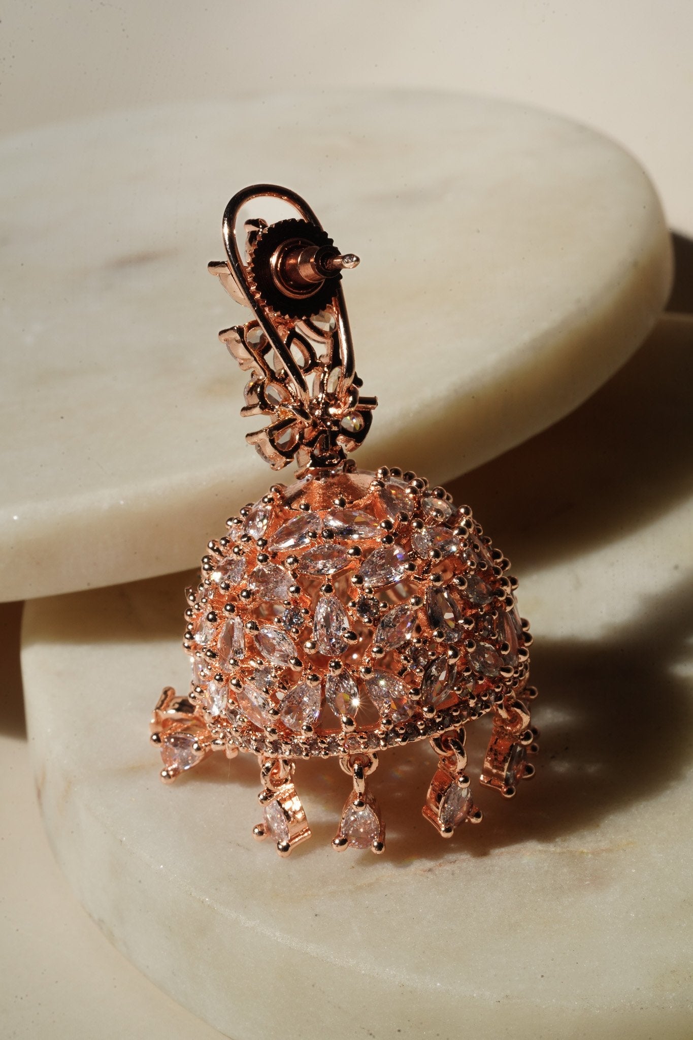Sneha Floral Jhumka Earrings - Rhodium or rose gold plated, featuring a detailed floral print design, perfect for Western and Indian attire.