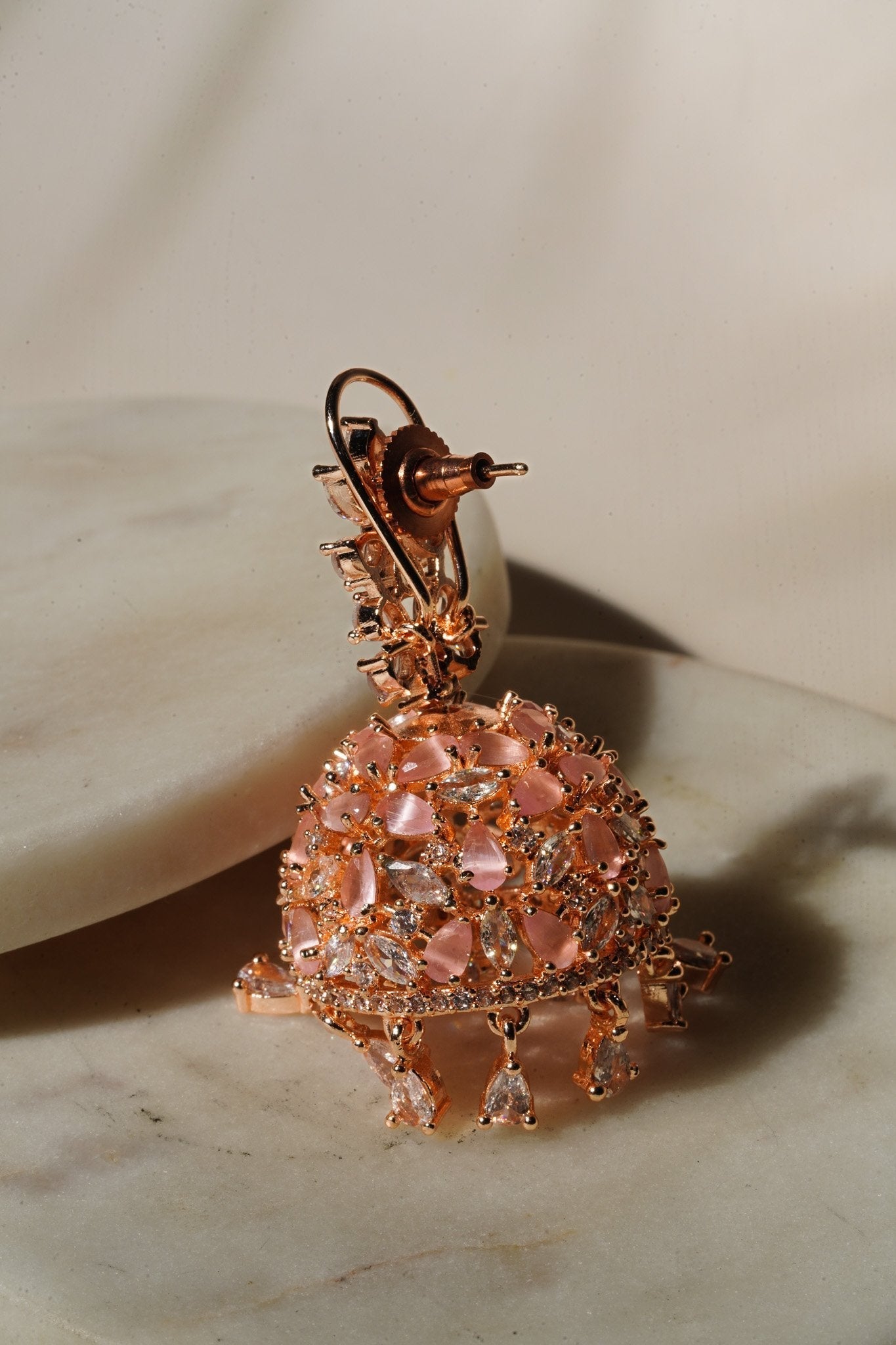 Sneha Floral Jhumka Earrings - Rhodium or rose gold plated, featuring a detailed floral print design, perfect for Western and Indian attire.
