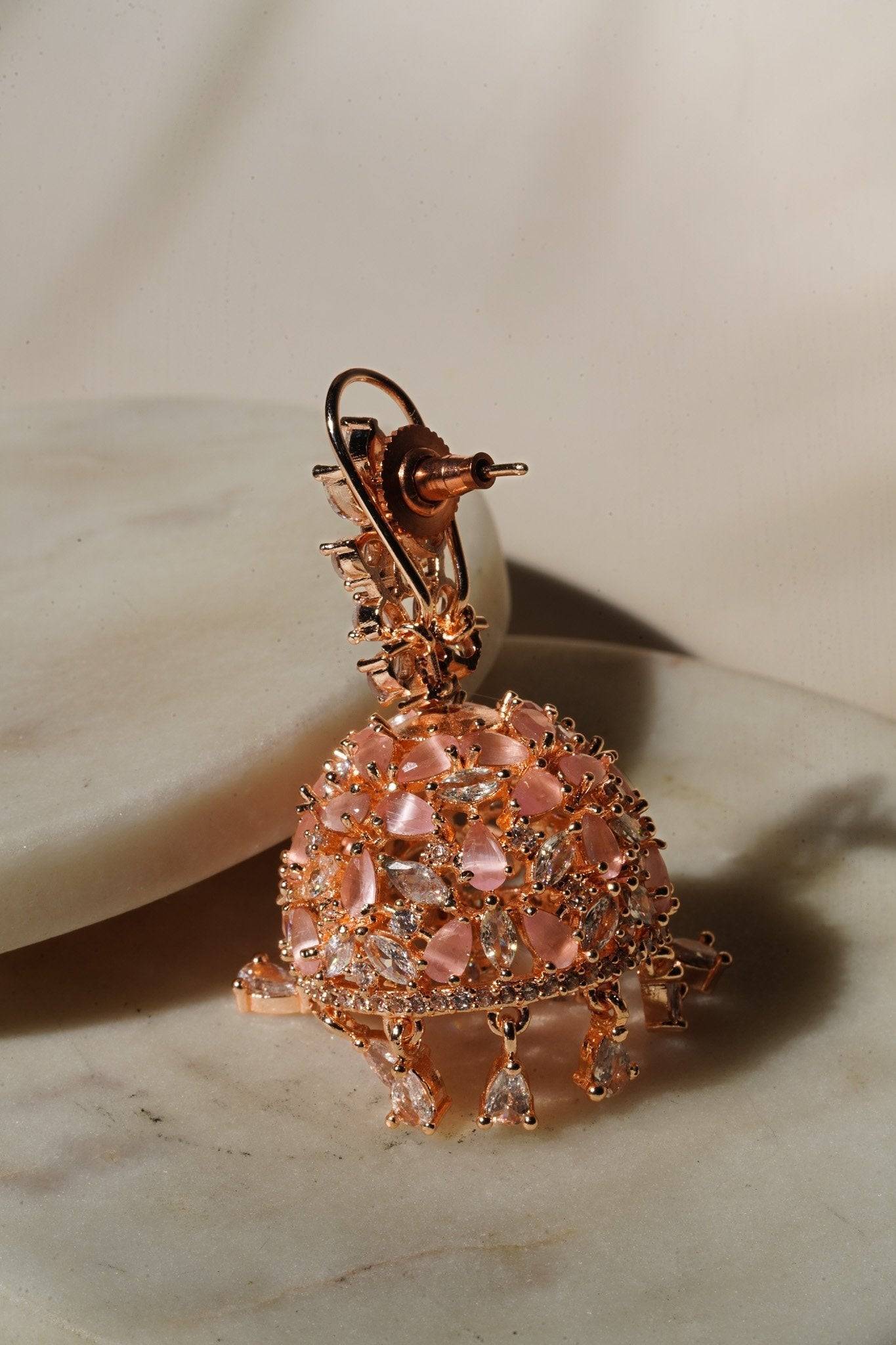 Sneha Floral Jhumka Earrings - Rhodium or rose gold plated, featuring a detailed floral print design, perfect for Western and Indian attire.