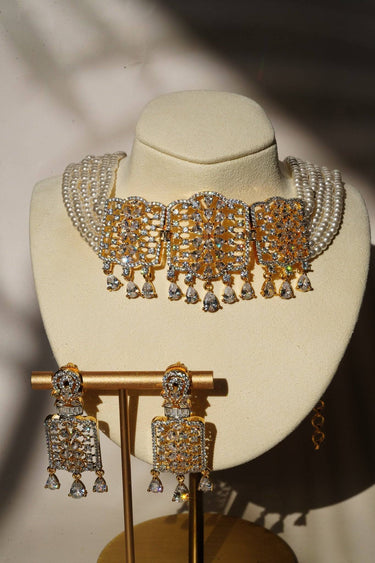 Sumra Gold & Pearl Choker Necklace Set with cubic zirconia, shown with matching earrings. Perfect for weddings and special events.